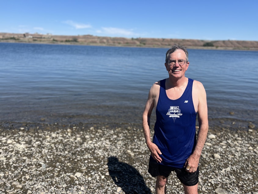 caption: For the past 25 years, Greg Patton has spent at least a few moments each month jumping in the Columbia River.