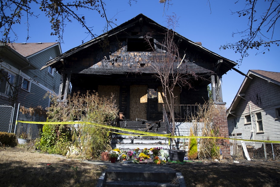 caption: A home near the intersection of North 48th Street and Whitman Avenue North, where two children and two adults were found deceased over the weekend, is shown on Tuesday, September 5, 2023, in the Wallingford neighborhood of Seattle. 