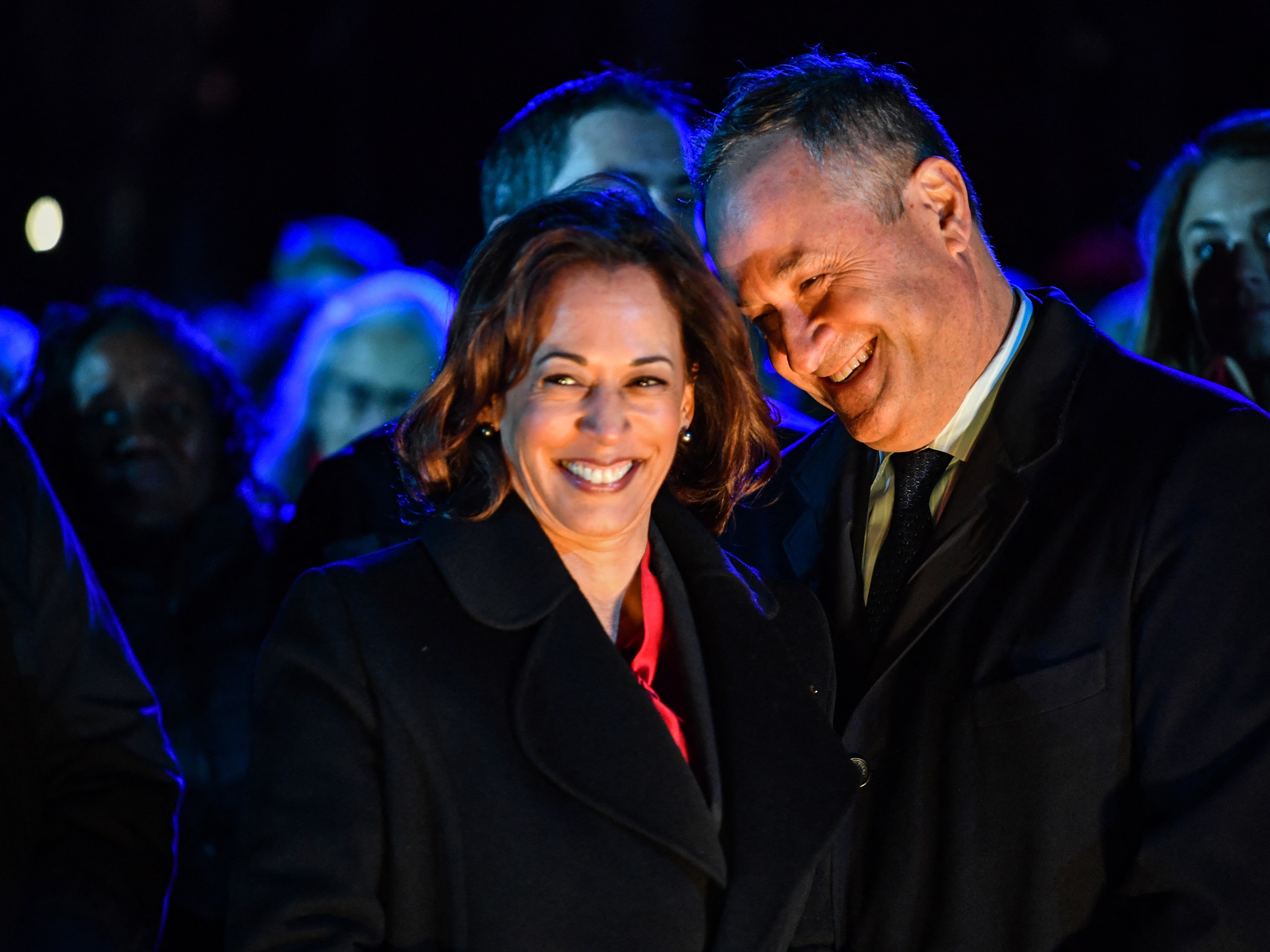 caption: In this file photo, Vice President Harris (L) and second gentleman Doug Emhoff attend the 100th National Christmas Tree Lighting on The Ellipse south of the White House in Washington, D.C., on Nov. 30, 2022. Harris and Emhoff host holiday celebrations at their official residence, including recently for Diwali and Rosh Hashanah.