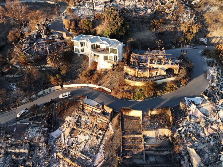 caption: Even in extreme winds and intense heat, some homes remain standing. Fire experts are finding there's a lot homeowners can do to increase the chances a house survives.