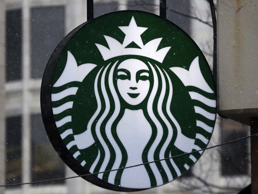 caption: The Starbucks logo is seen on a shop, March 14, 2017, in downtown Pittsburgh.