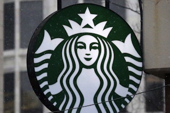 caption: The Starbucks logo is seen on a shop, March 14, 2017, in downtown Pittsburgh.