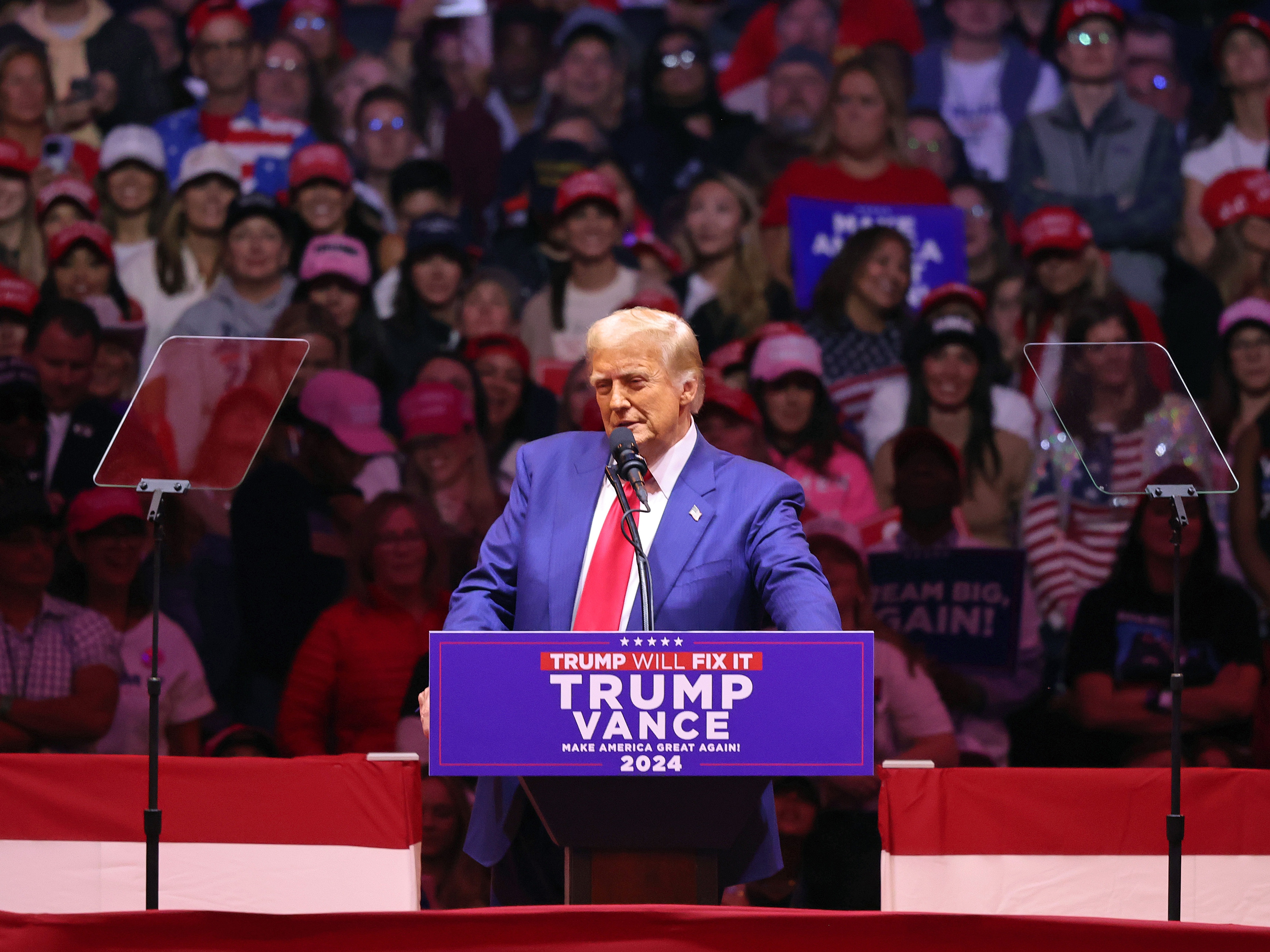 caption: Republican presidential nominee, former U.S. President Donald Trump, speaks at a campaign rally at Madison Square Garden on Sunday in New York City.
