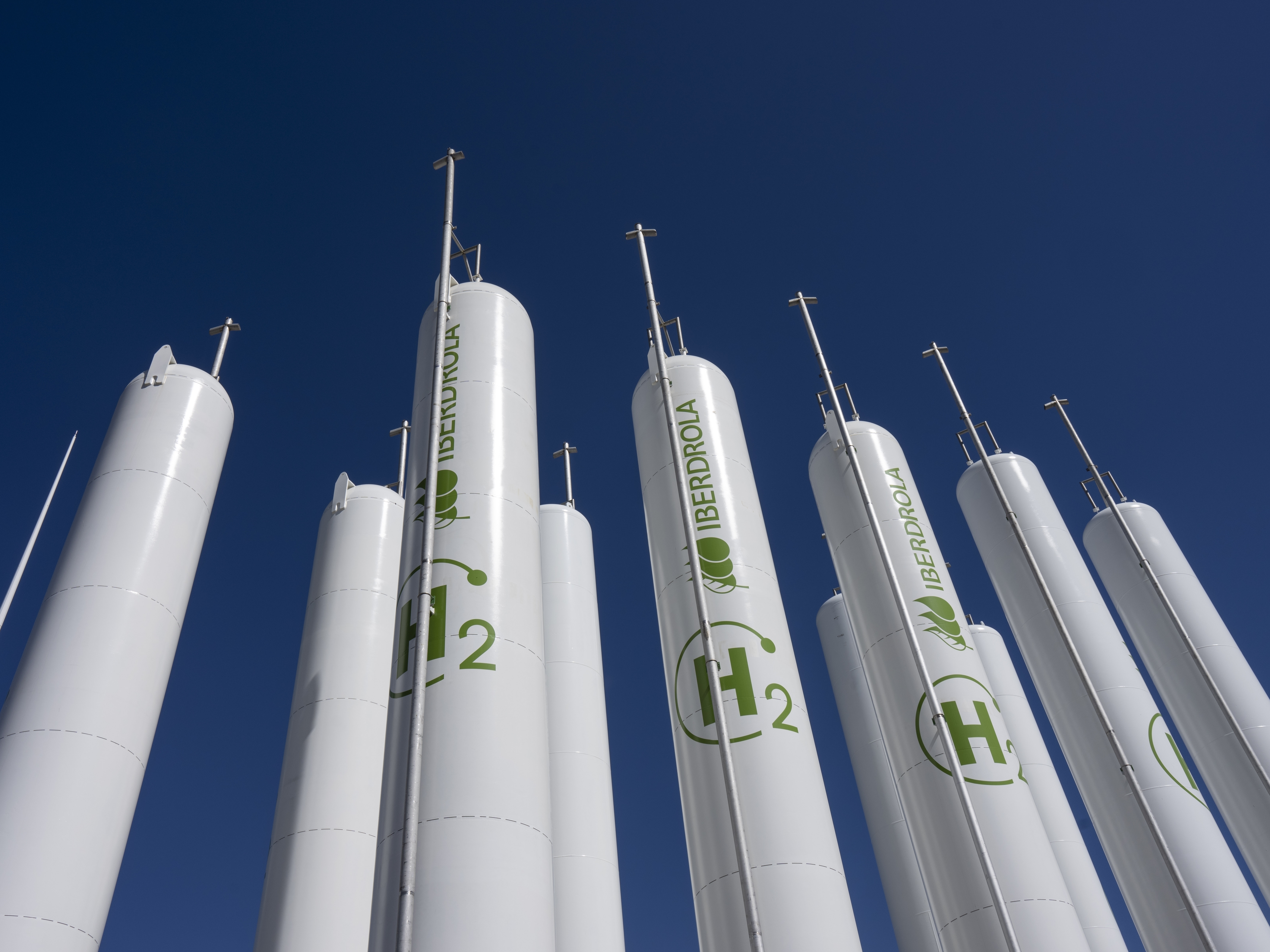 caption: Hydrogen storage tanks are visible at the Iberdrola green hydrogen plant in Puertollano, central Spain, on March 28. The Biden administration on Friday released its highly anticipated proposal for how the U.S. plans to dole out tax credits to hydrogen producers.