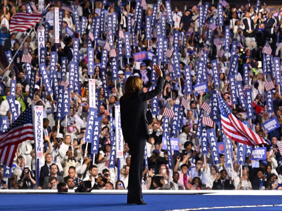 caption: Vice President Harris, the Democratic presidential nominee, arrives onstage to speak on the fourth and last day of the Democratic National Convention in Chicago on Thursday.