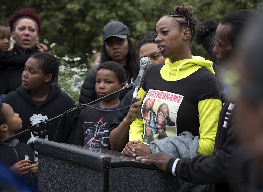 caption: Tiffany Rogers, a sister of Charleena Lyles, speaks during a vigil on Tuesday, June 19, 2017, at Solid Ground Brettler Family Place, in Seattle, Washington. 