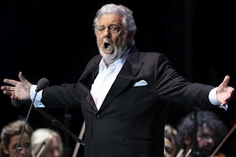 caption: Opera star Plácido Domingo, performing at a concert in Marbella, Spain on July 11.