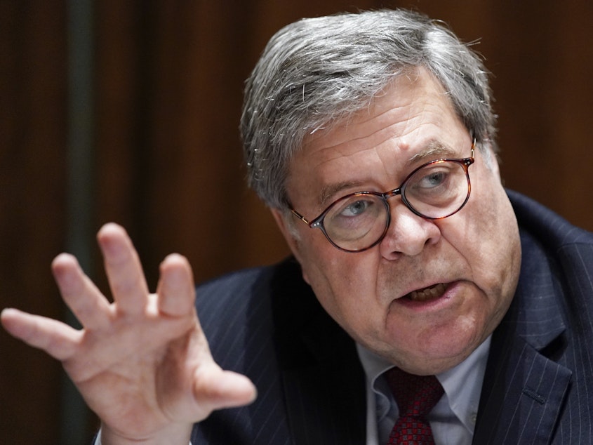 caption: Critics have called Attorney General William Barr too willing to do the bidding of President Trump. Justice Department attorneys say they've seen political pressure in big cases.