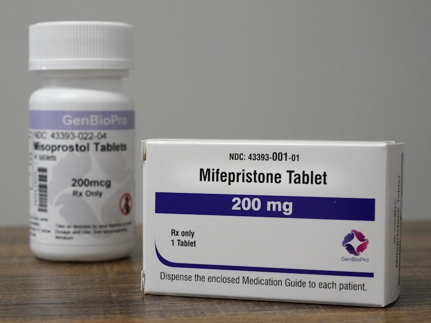 caption: Containers of mifepristone and misoprostol — medications used to end a pregnancy — sit on a table inside of a Planned Parenthood clinic in Fairview Heights, Ill.