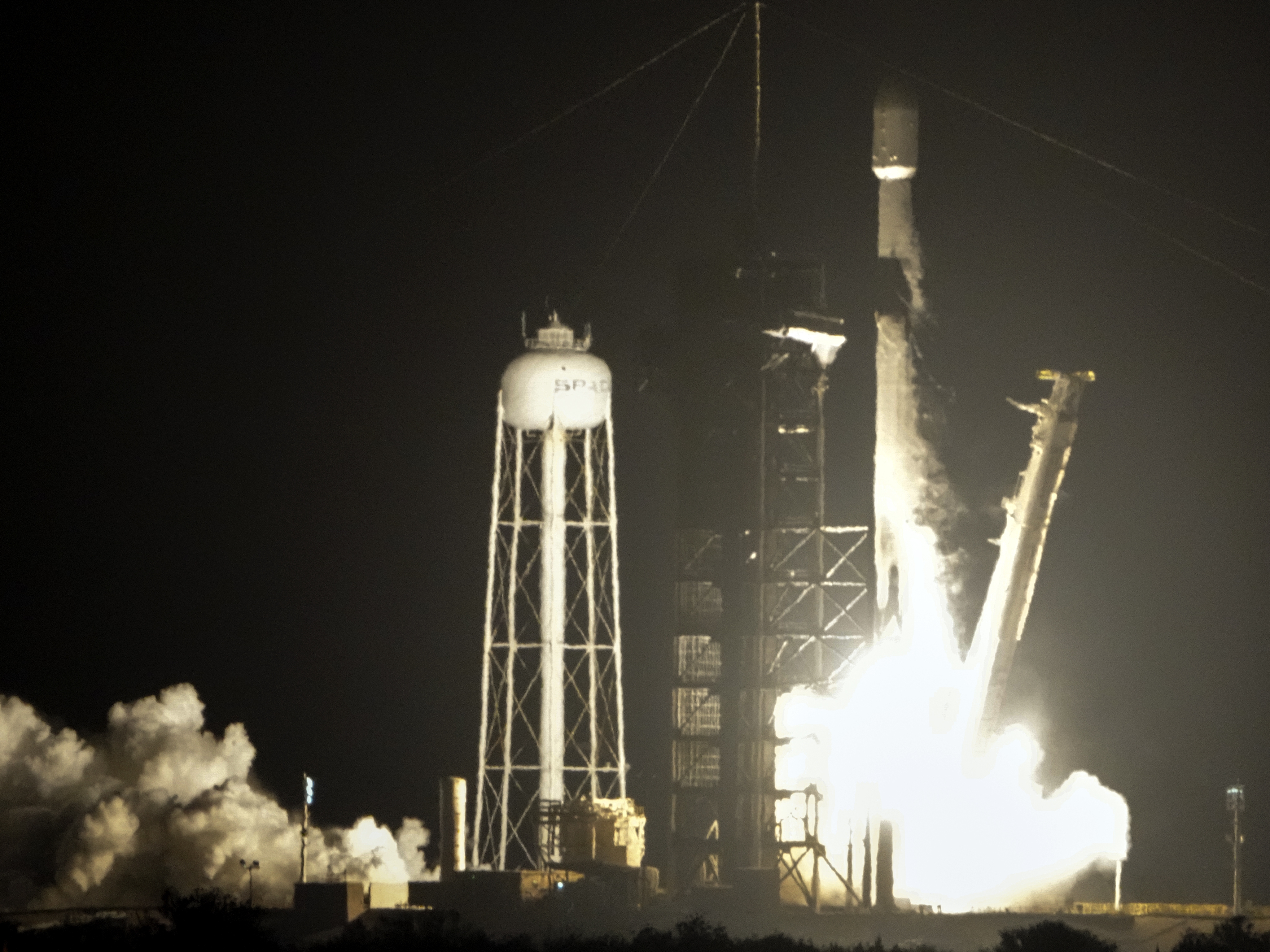 caption: A SpaceX Falcon 9 rocket lifts off with a payload of a pair of lunar landers at the Kennedy Space Center in Cape Canaveral, Fla., Wednesday, Jan. 15, 2025.