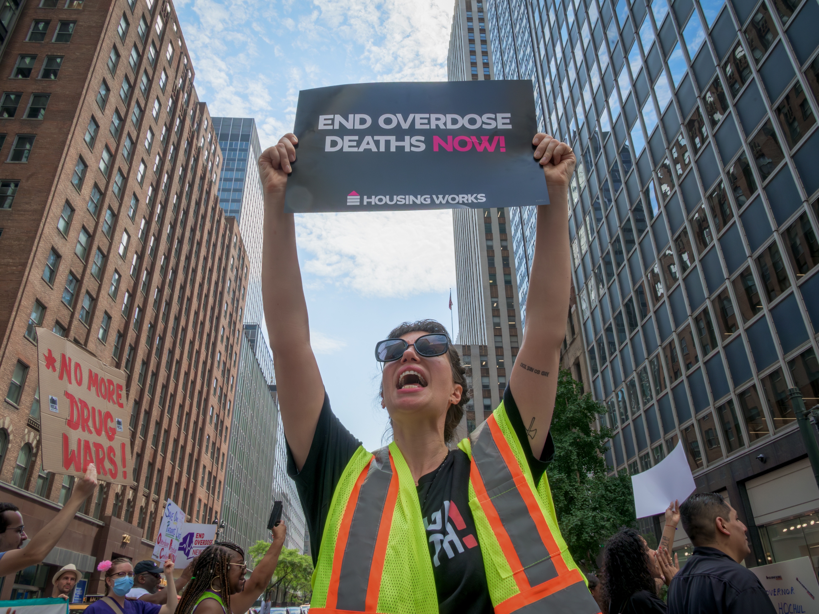 caption: A demonstrator holds a sign during International Overdose Awareness Day on Aug. 28, 2024 in New York City.