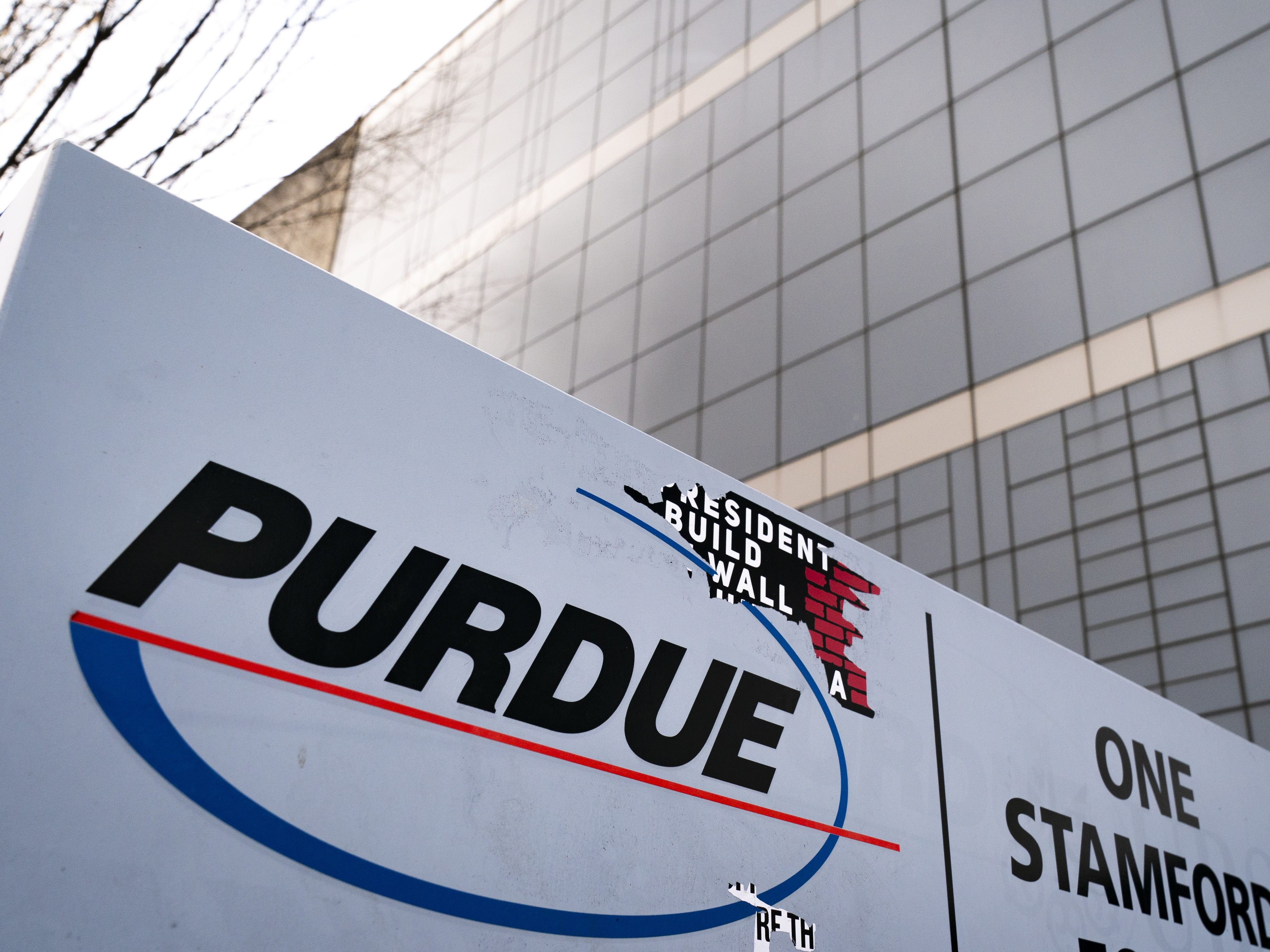 caption: With a federal judge poised to approve the Purdue Pharma's controversial Chapter 11 plan, the company is working behind the scenes to preempt a legal challenge by the Department of Justice.