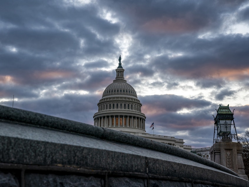 caption: The Capitol is seen in Washington, early Monday, Jan. 6, 2020, as Congress returns to Washington to face the challenge of fallout from President Donald Trump's military strike in Iraq that killed Iranian official, Gen. Qassem Soleimani.