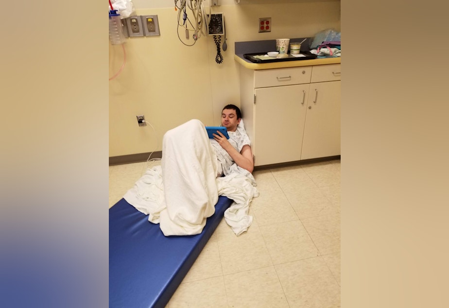 caption: At St. Peter's Hospital in Olympia, Guinotte slept on the floor because he would use his bed frame to reach the ceiling tiles and knock them down.

