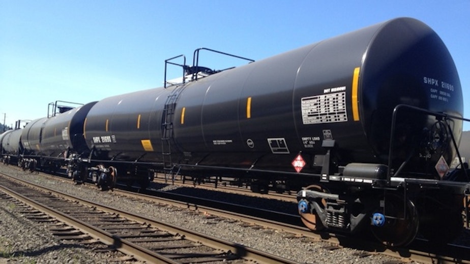 caption: File photo of oil train tankers in a Portland, Ore. railyard.