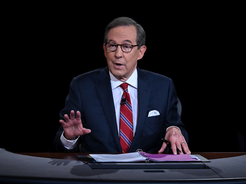 caption: Chris Wallace of Fox News moderates a 2020 presidential debate. Wallace says he's leaving the network after 18 years and is "ready for a new adventure."