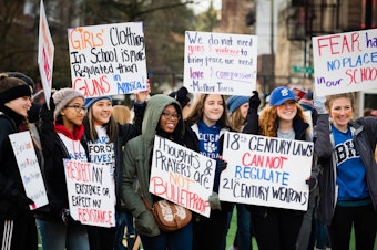 caption: Student marchers at Seattle's Cal Anderson Park