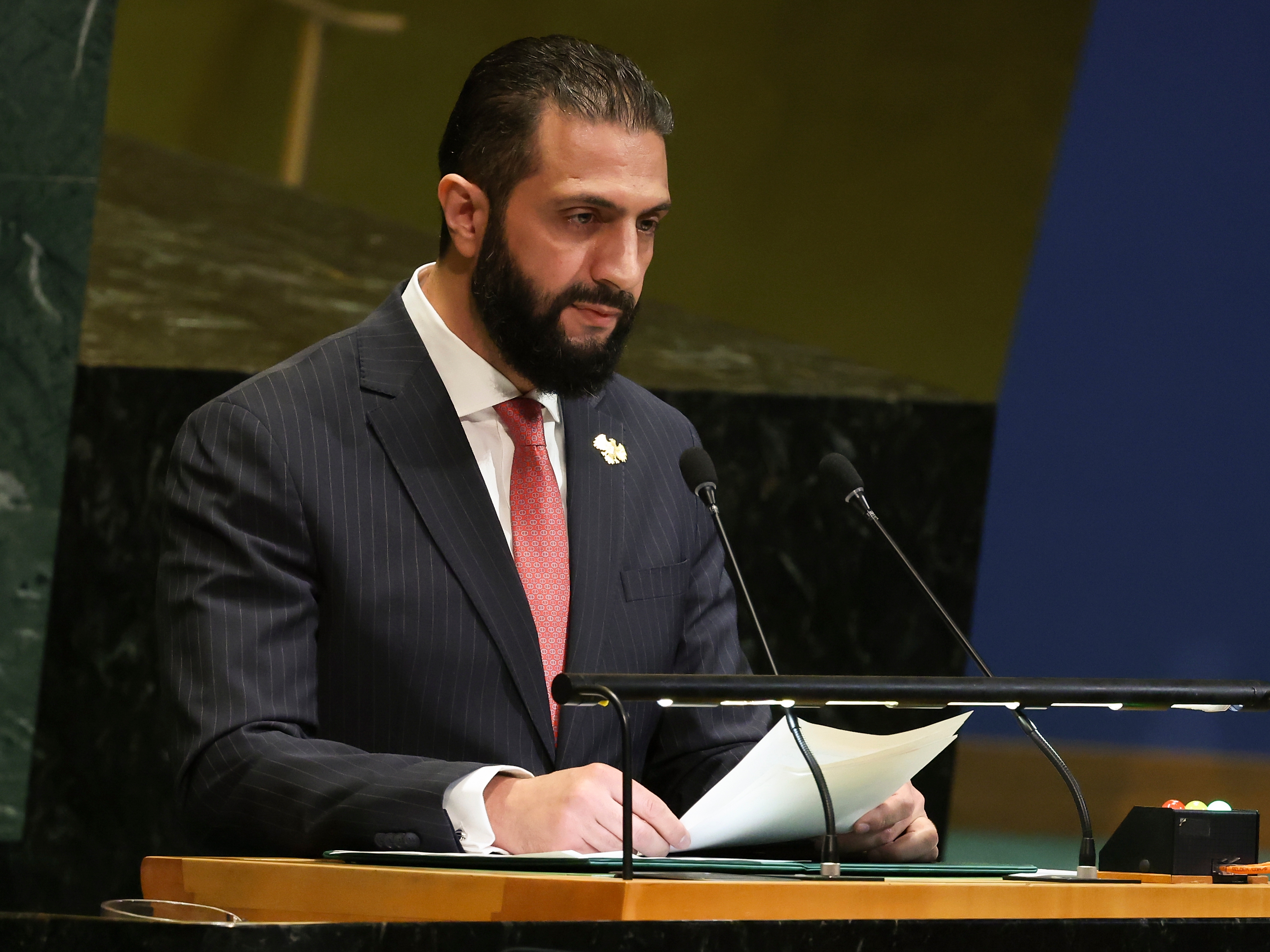 caption: Syria President Ahmad Al-Sharaa speaks during the 80th session of the United Nations General Assembly on Wednesday at U.N. headquarters.