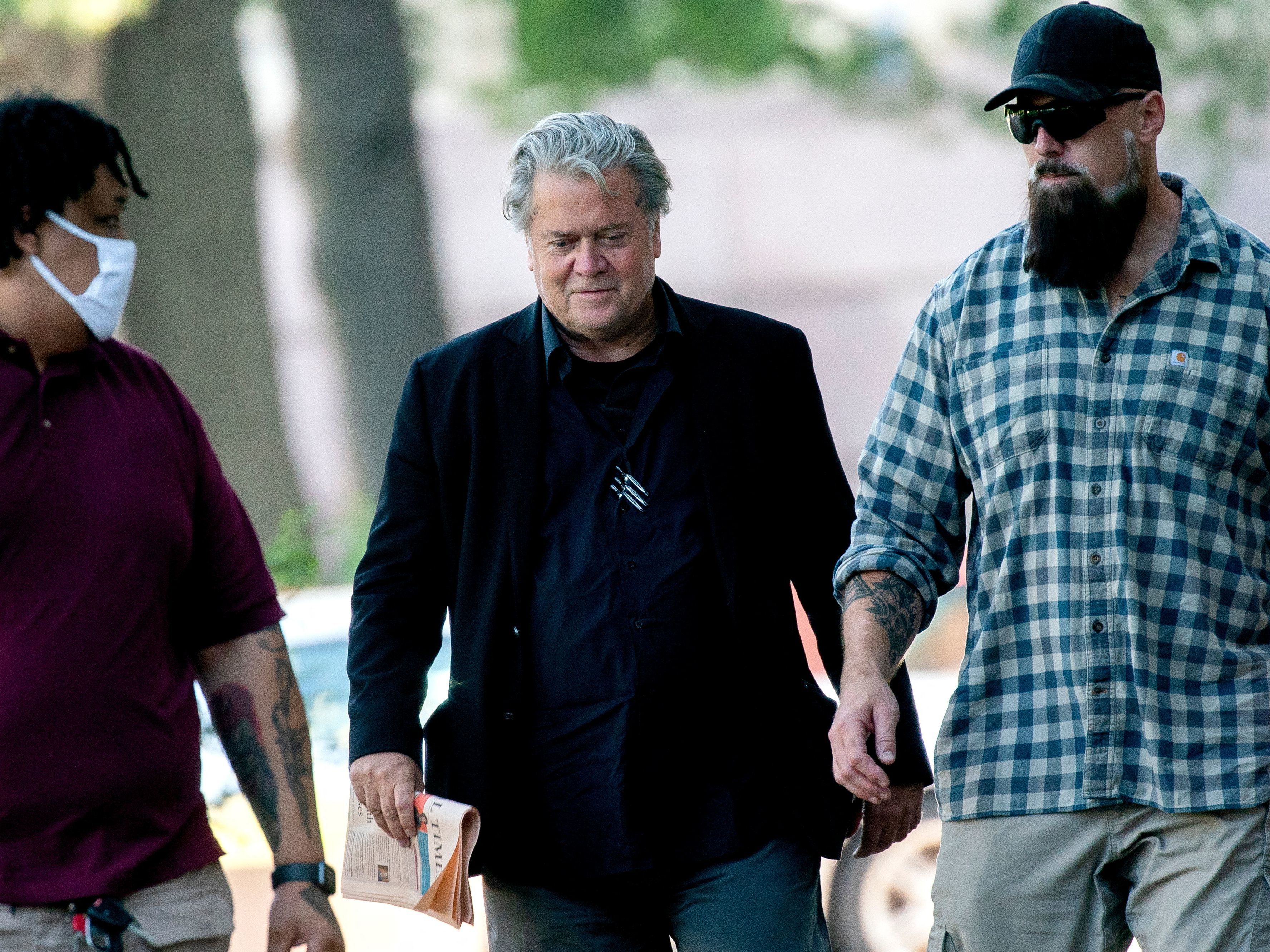 caption: Former White House chief strategist Steve Bannon arrives at the U.S. District Court House as his trial for contempt of Congress continues on Wednesday.