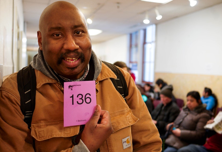 caption: Steve Graham was No. 136 among people waiting Monday, February 22, 2016, for a chance to apply 110 low-income apartments.  'I'm keeping my fingers, toes and everything else crossed,' he said.