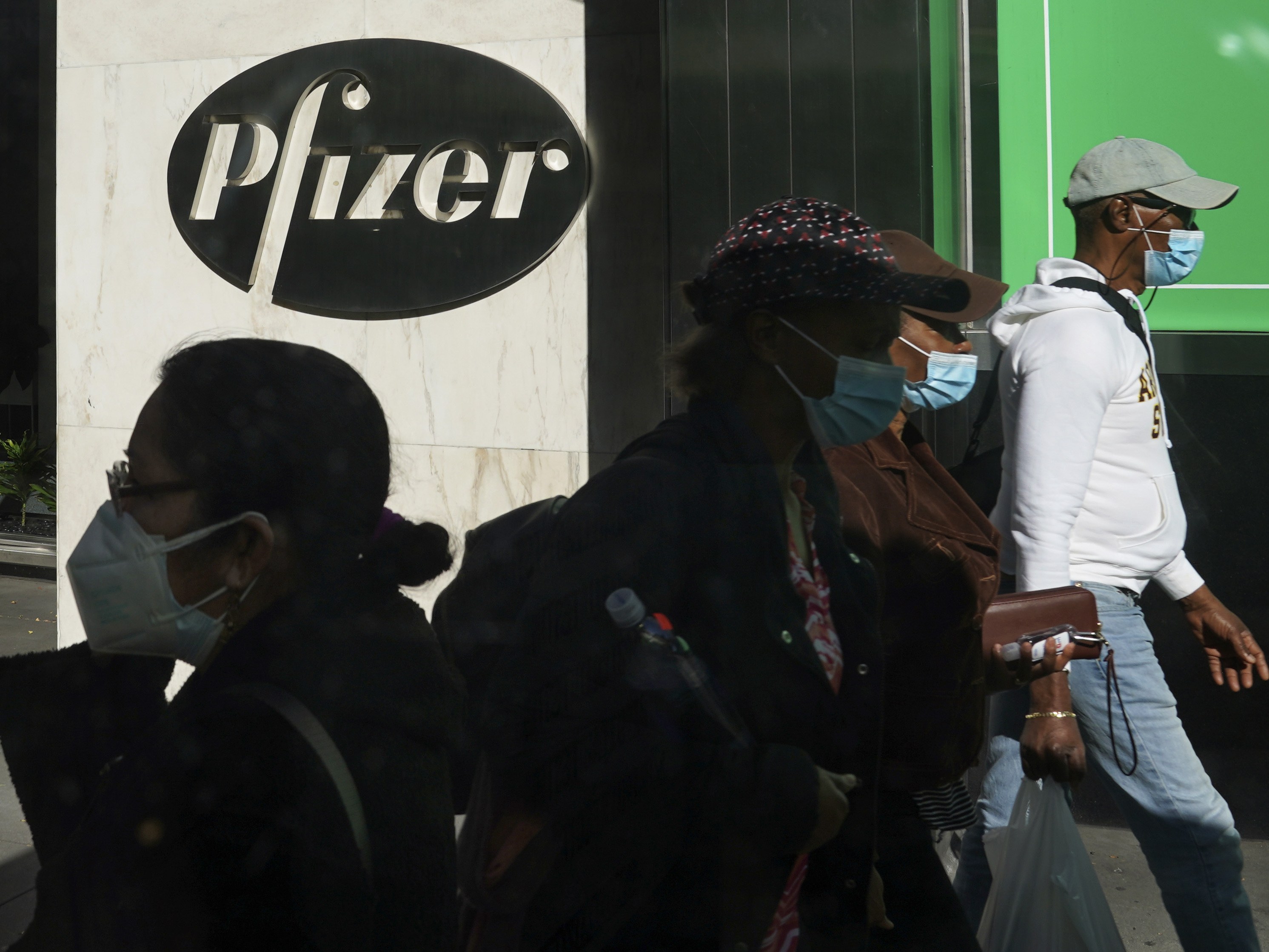 caption: Pfizer plans to file within days with the Food and Drug Administration to allow emergency use of its COVID-19 vaccine.