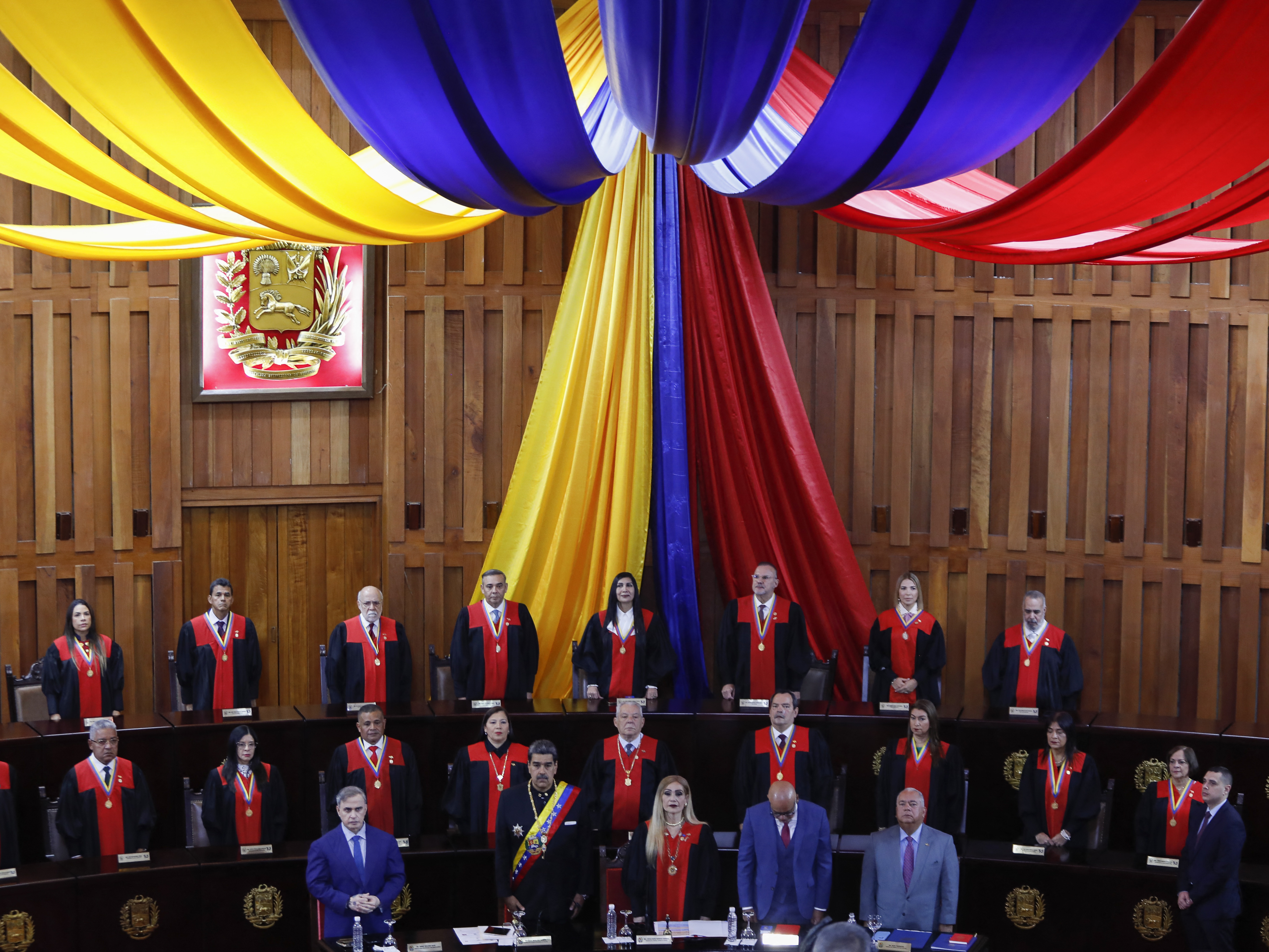 caption: Front row, from left: Venezuela's attorney general, Tarek William Saab; President Nicolás Maduro; Supreme Court President Caryslia Rodríguez; National Assembly President Jorge Rodríguez; and the president of the National Electoral Council, Elvis Amoroso. They are attending a ceremony in the Supreme Court building in Caracas on Jan. 31.