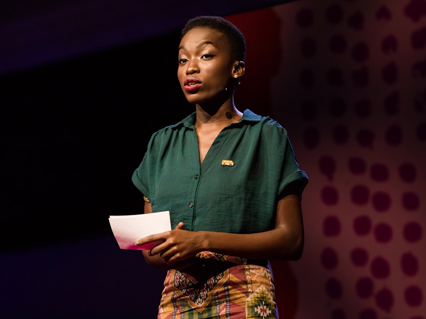 caption: OluTimehin Adegbeye on the TED stage.