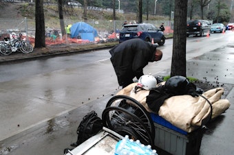 caption: George Kerns is moving to another homeless camp. He knows it won't be the last time he's told to move on