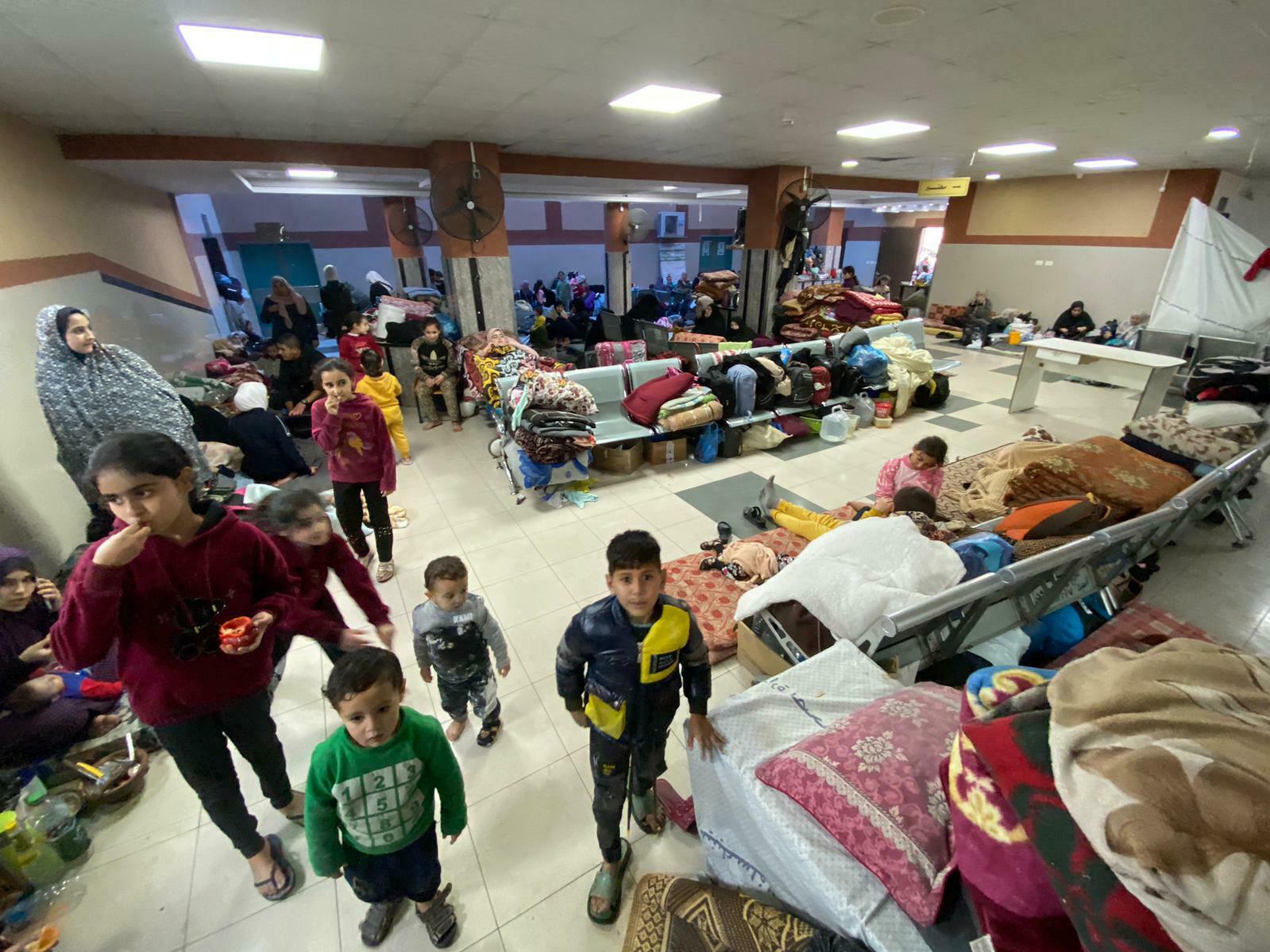 caption: Thousands of Palestinians have taken shelter at the Nasser Medical Complex in Khan Younis, Gaza Strip, as Israeli forces press an offensive nearby.