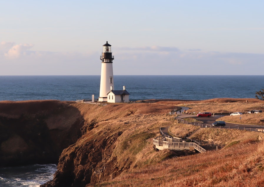 caption: The Yaquina Head Lighthouse celebrates its 150th birthday in 2023.