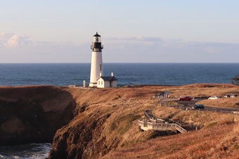 caption: The Yaquina Head Lighthouse celebrates its 150th birthday in 2023.