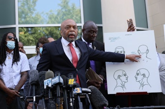 caption: Speaking to reporters on April 27 in Elizabeth City, N.C., Wayne Kendall, one of the lawyers representing the family of Andrew Brown Jr., points to an autopsy chart showing where Brown was shot.