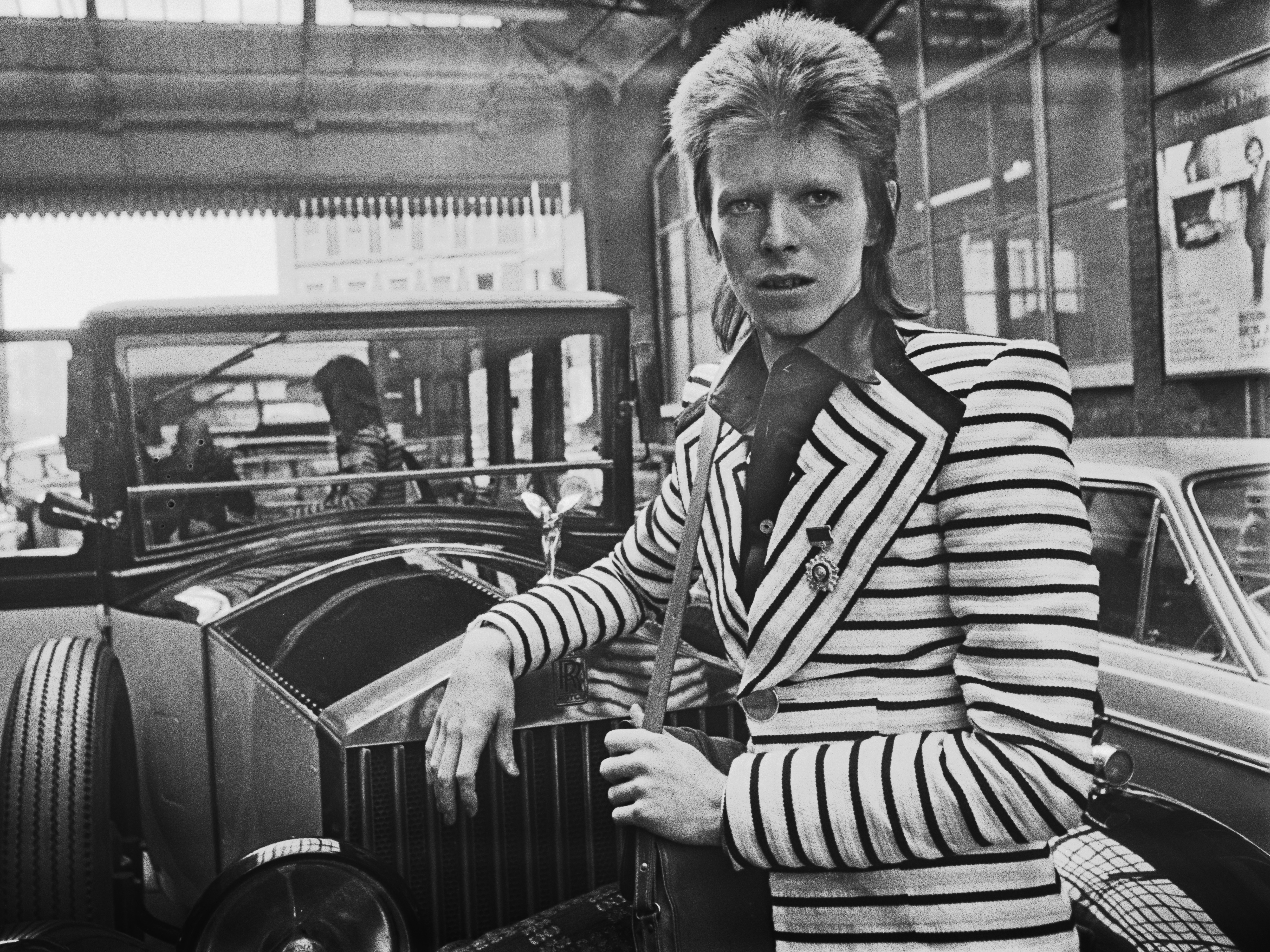 caption: David Bowie debuted his Ziggy Stardust persona and released <em>The Rise and Fall of Ziggy Stardust and the Spiders from Mars</em> in 1972 — the last year humans went to the moon.