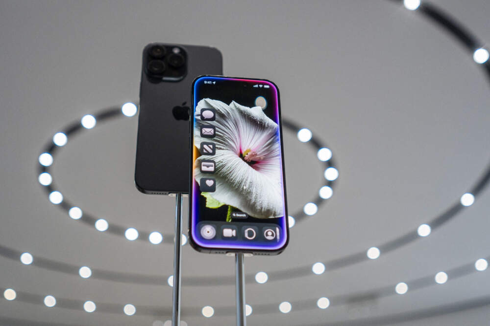 caption: New models of the Apple iPhone 16 are displayed after Apple's "It's Glowtime" event in Cupertino, California, Sept. 9, 2024. Apple announced a new iPhone built for generative artificial intelligence as it seeks to boost sales and show it is keeping up in the technology race. (Nic Coury/AFP via Getty Images)