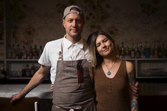 caption: Chef David Nichols, left, and manager Kate Willman stand for a portrait on Thursday, January 22, 2020, at Eight Row in Seattle. The pair launched a Seattle chapter of Ben's Friends, a support group for professionals in the food and beverage industry that struggle with addiction and substance abuse.