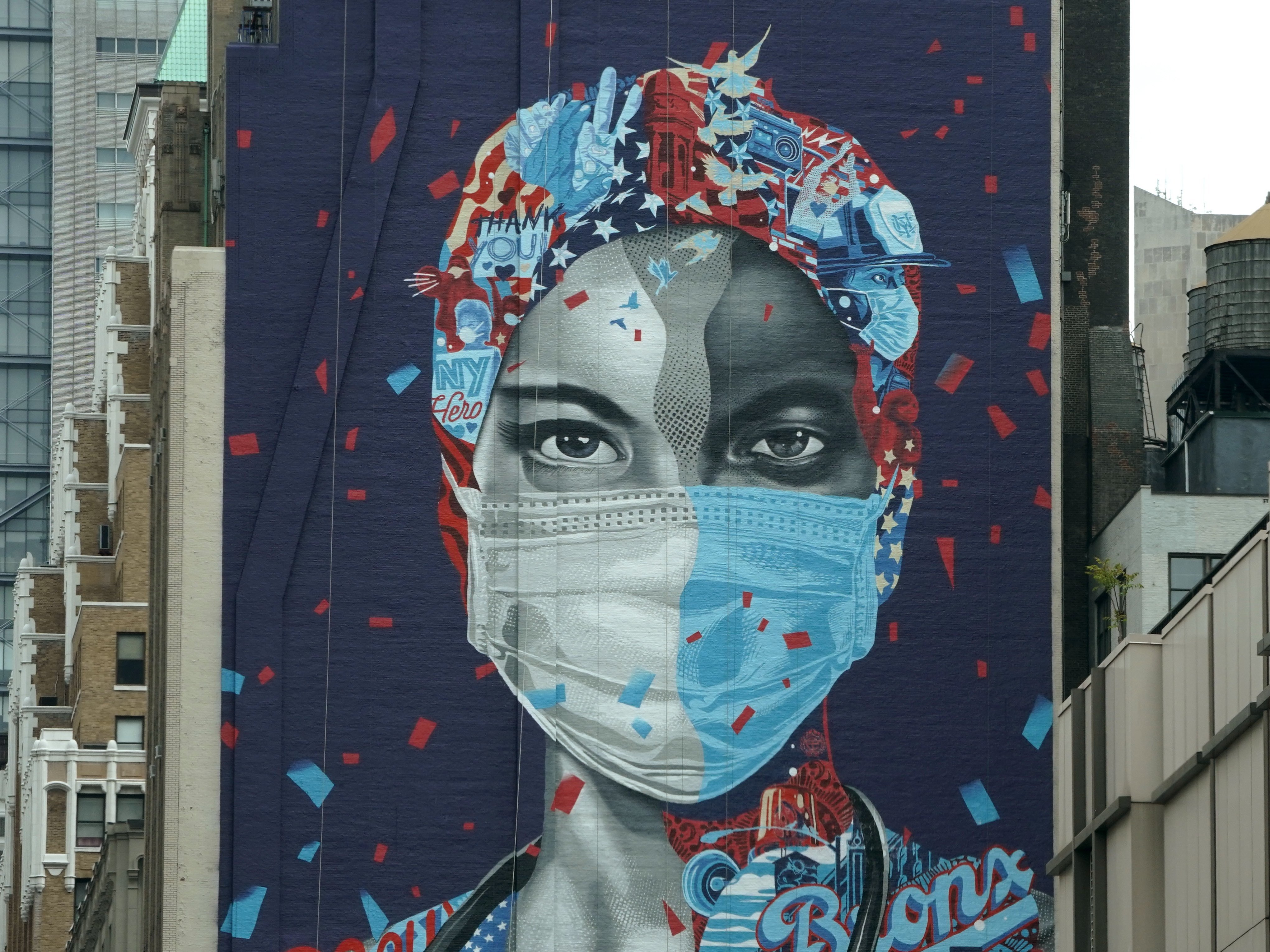 A mural honoring health care workers at Montefiore Medical Center in the Bronx is seen on the side of a building in Midtown Manhattan on May 11 in New York.