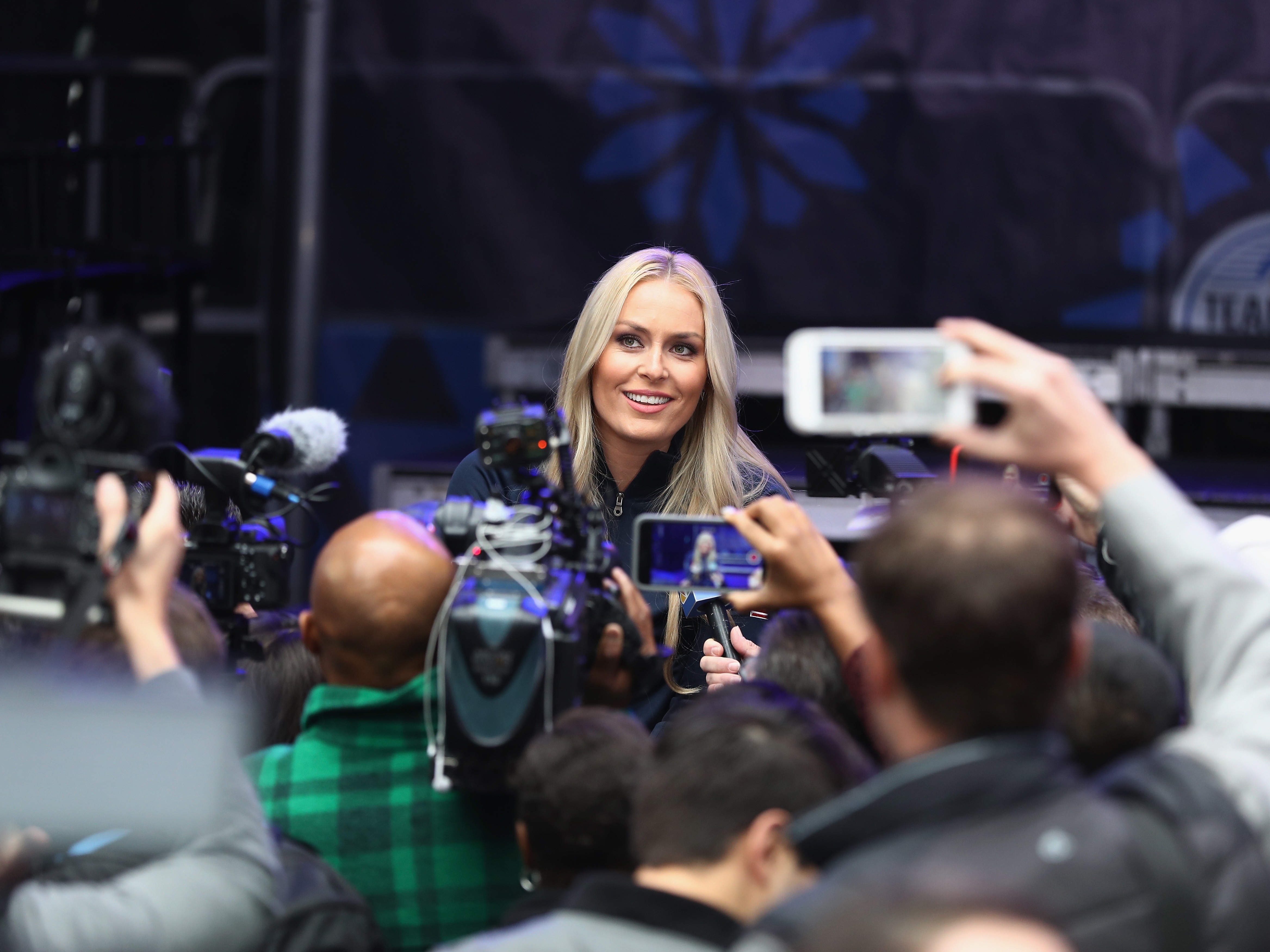 caption: Record-setting skier Lindsey Vonn says she is mounting a comeback at age 40. She's seen here in 2017, speaking to media ahead of the Pyeongchang Winter Olympics.