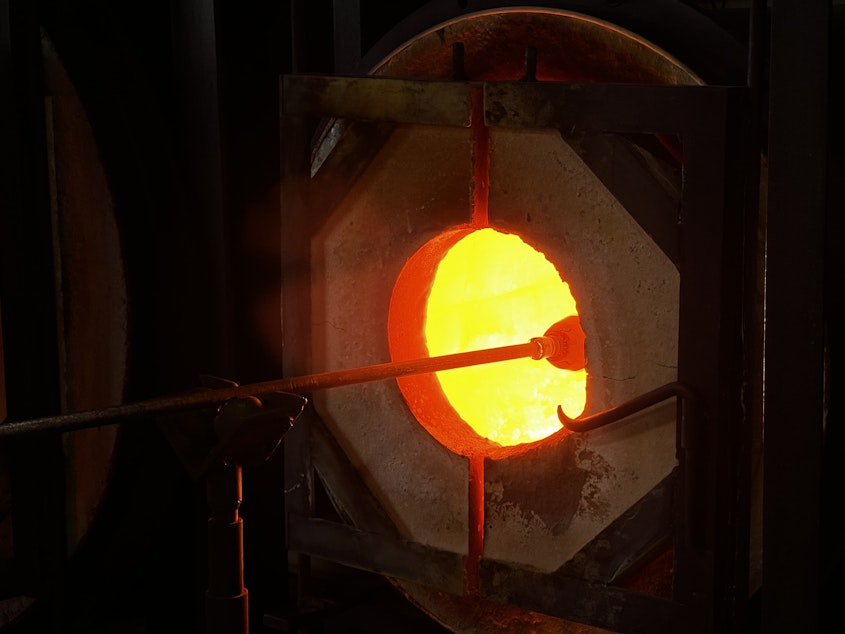 caption: Glass is inserted into the kiln, which always stays on to keep its heat constant.