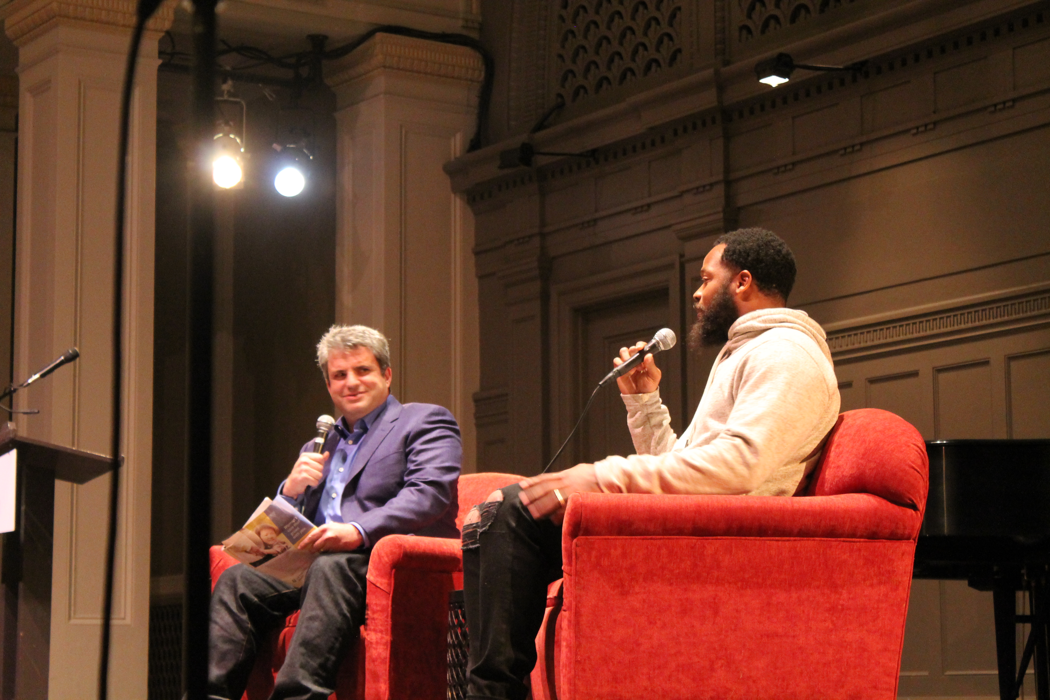 caption: Dave Zirin and Michael Bennett at Town Hall Seattle