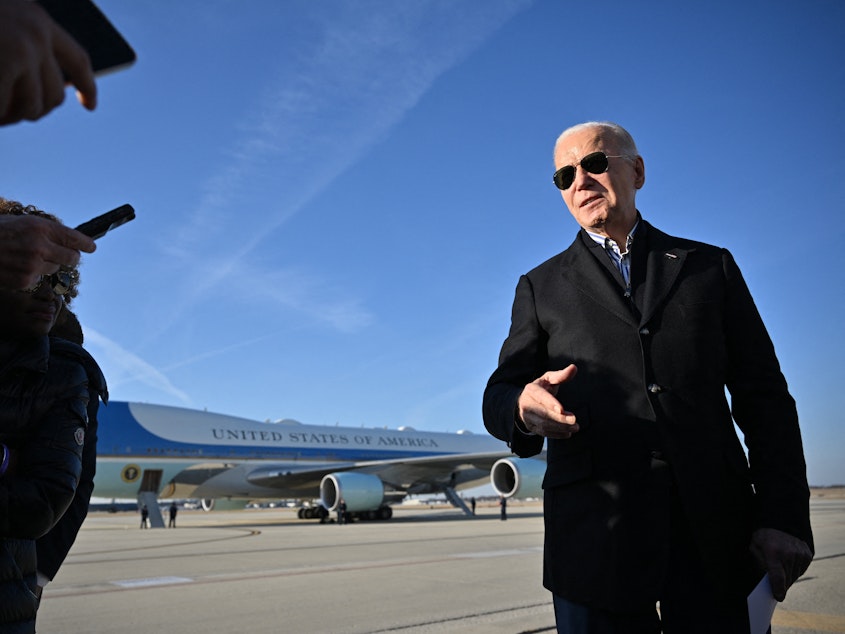 caption: President Biden speaks to reporters in Milwaukee before boarding Air Force One on Wednesday. The president announced Friday he would expand pardons for simple marijuana possession.