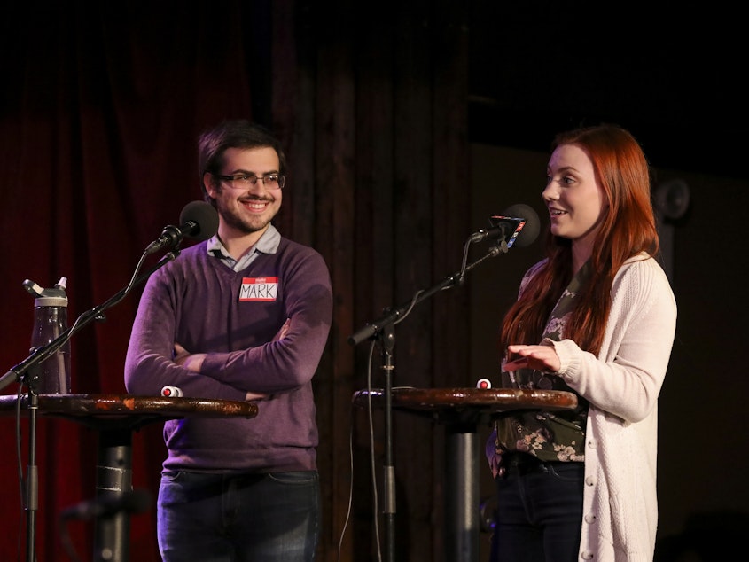 caption: Contestants Mark Gartsbeyn and Elizabeth Foland appear on <em>Ask Me Another</em> at the Bell House in Brooklyn, New York.