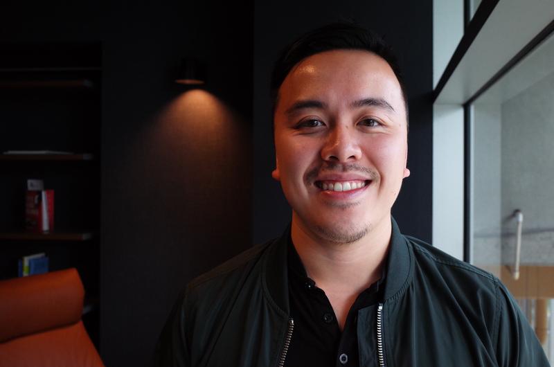 caption: Justin Woo, organizer of the Blockchain NW conference and co-founder of local startup Blocknauts.