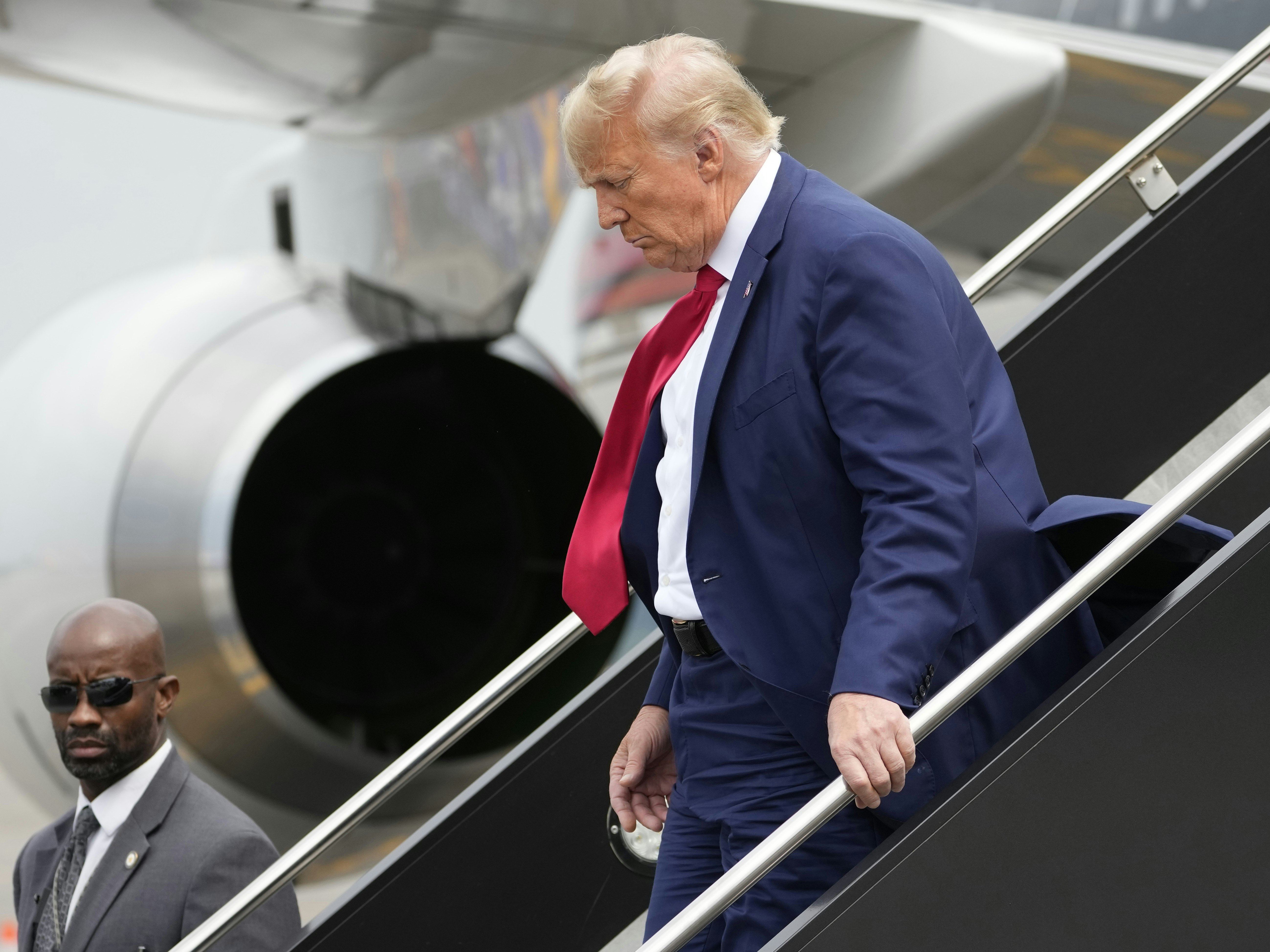 KUOW - Trump heads to Iowa hoping to refocus attention from shootings to the economy
