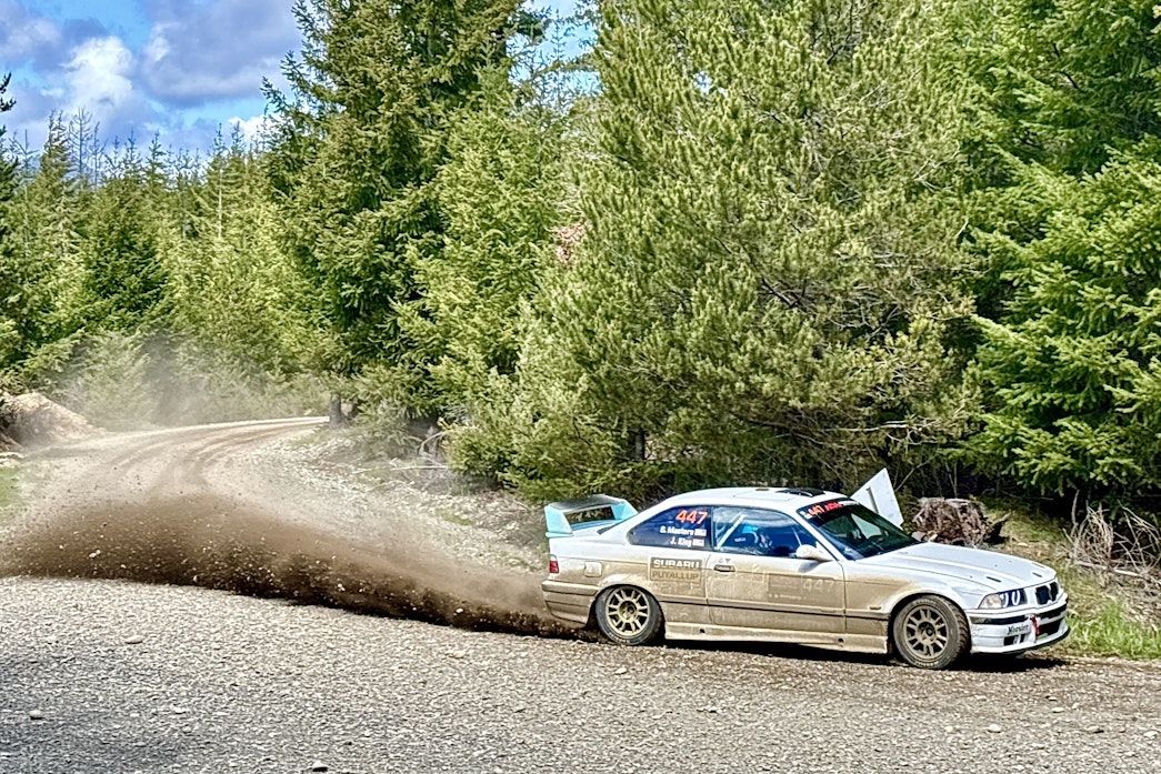 caption: Car 447, driven by Jennifer King and with co-driver Stacy Masters, sends up a trail of dirt and rocks through flying finish at the Olympus Rally's Power Stage on April 21, 2024. The rally drew dozens of volunteers and spectators to the Olympic Peninsula to watch the regional and national competitors. 