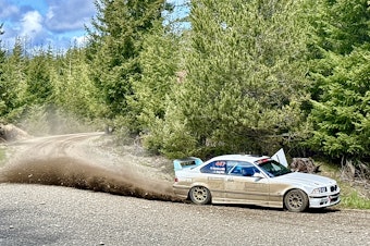 caption: Car 447, driven by Jennifer King and with co-driver Stacy Masters, sends up a trail of dirt and rocks through flying finish at the Olympus Rally's Power Stage on April 21, 2024. The rally drew dozens of volunteers and spectators to the Olympic Peninsula to watch the regional and national competitors. 