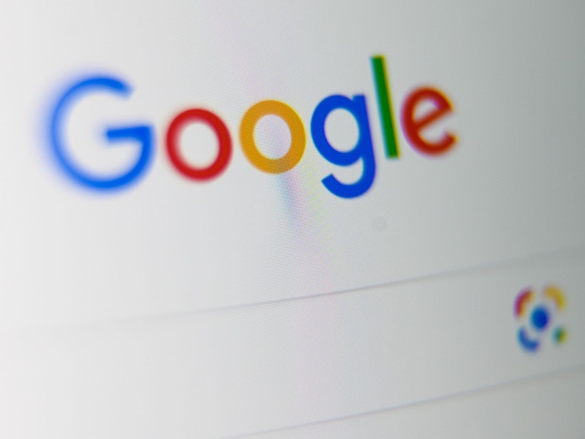 caption: Google is the latest tech company to tighten its election-related policies ahead of November's vote.
