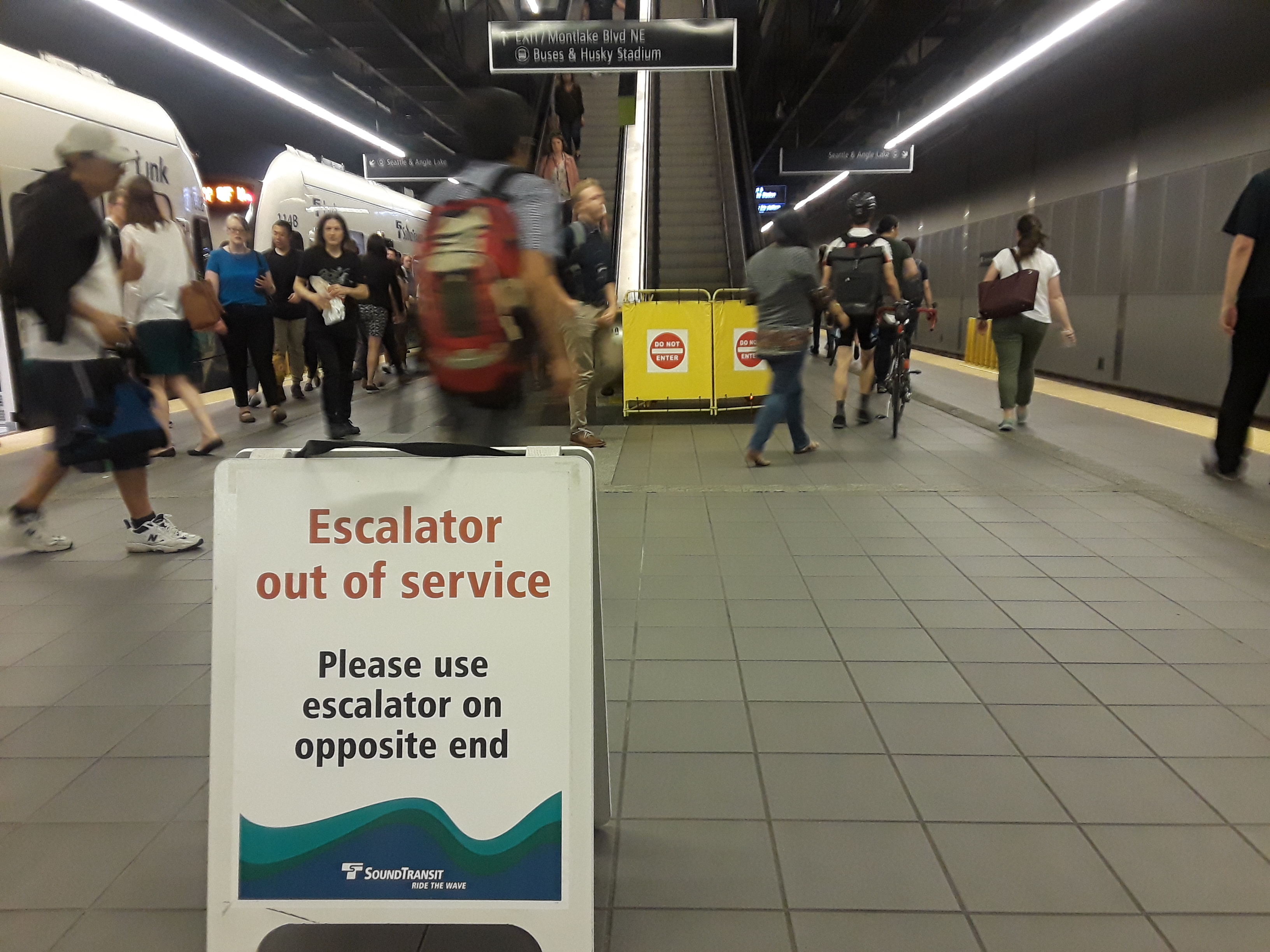 caption: This escalator's days are numbered. Escalators at the University of Washington light rail station, like this one, are prone to failure as they are not built to withstand heavy use. 