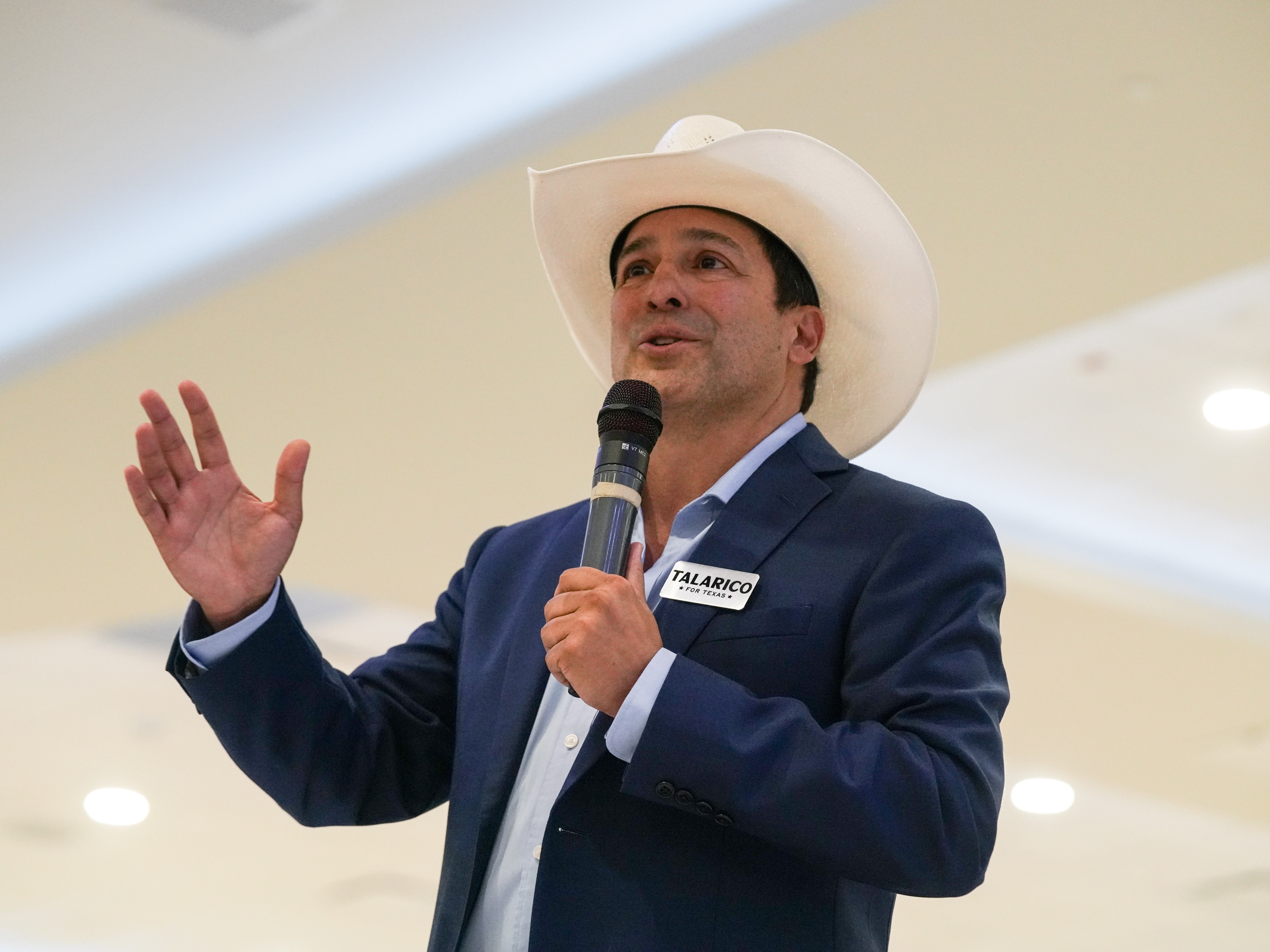 caption: Bobby Pulido at a campaign event in February.
