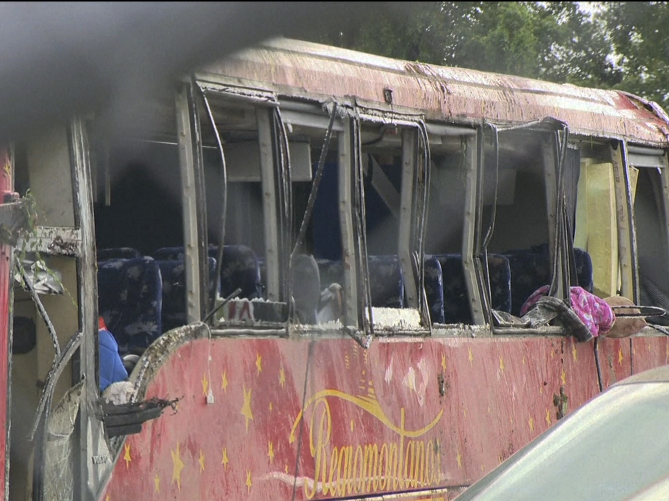 caption: A damaged bus is shown after several people were killed and dozens injured after the commercial bus overturned on Interstate 20 early Saturday in Warren County, Miss., according to the Mississippi Highway Patrol. 