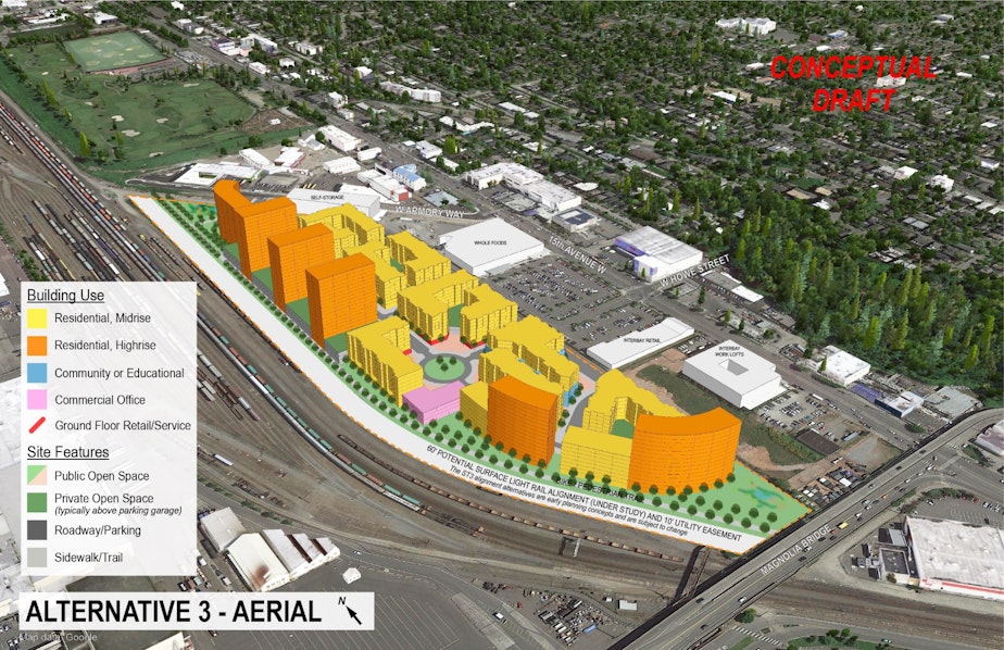caption: Makers Architecture and Urban Design examined various scenarios, from leaving the low density industrial zoning on the property as is, to rezoning it for residential towers as shown here. Next to the rail yard is the future light rail line (route still to be finalized) and a bike trail.